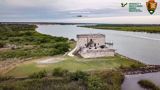 flyover image of fort matanzas used as a splash screen for the virtual tour USF and NPS Arrowhead are located in the top right hand corner in the center of the screen a loading icon