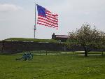 The Garrison Flag flies over the fort.