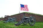 Cannon outside the fort & the Garrison Flag.