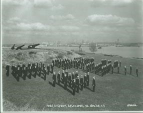 Men standing for inspection at the U.S. Coast Guard Training Station.