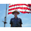A ranger's duties include flag programs at the fort.