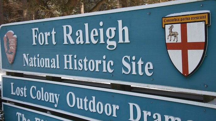 Snow-dusted Fort Raleigh National Historic Site entrance sign