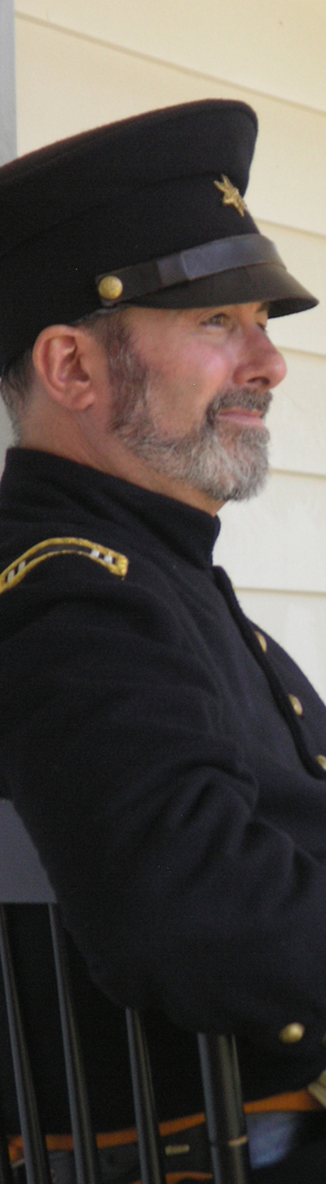 Volunteer Mike McCartney playing officer