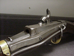 Breechloader (breech flips up to allow cartridge to be loaded)