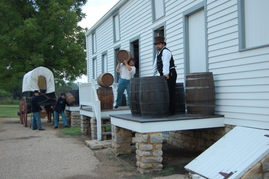 FSNHS staff and volunteers recreate a scene at the quartermaster storehouse.