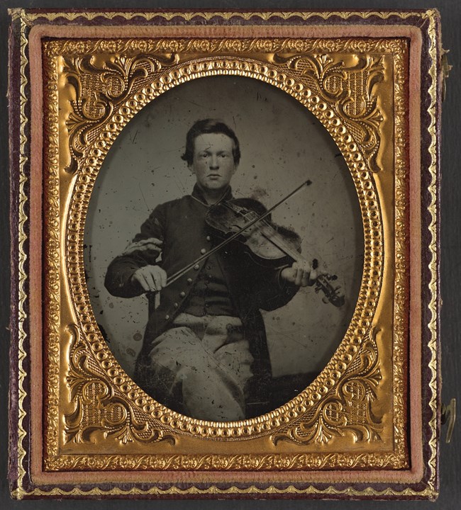 Unidentified soldier in Union corporal's uniform with viola