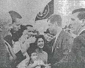 newspaper photo showing JFK greeting crowd at Fort Smith