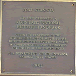 a brassy plaque: Fort Stanwix. Registered National Historic Landmark. 1963
