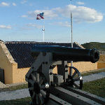Fort Moultrie with a cannon in the foreground.