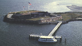 Aerial view of Fort Sumter with ferry boat docked.