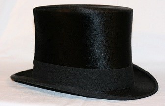 A shiny black top hat made from fur with a more solid black band at its base.