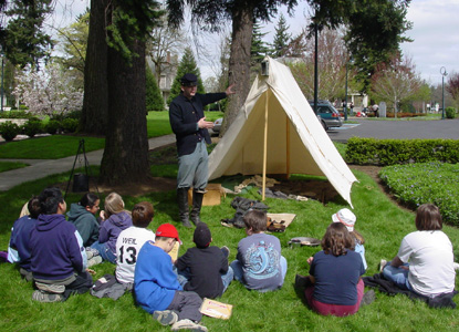 Students participate in the School of the Soldier hands-on education program.