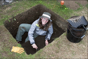 Image of a student at an archaeological excavation onsite