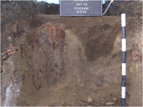 Image of the inside of a pit or trench dug by archaeologists
