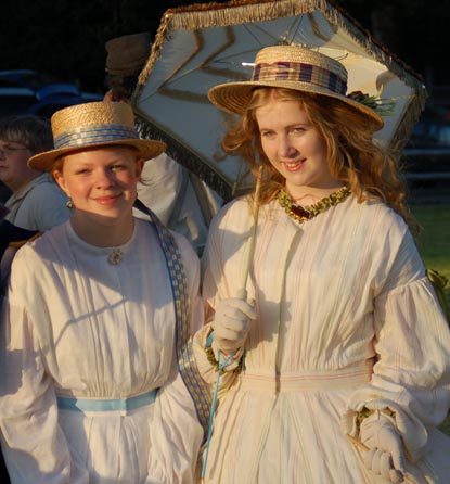 Young women in 1860s attire