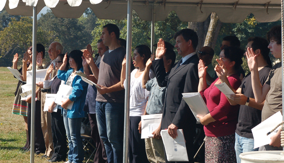 Candidates take the Oath of Citizenship at the 2012 ceremony at Fort Vancouver.