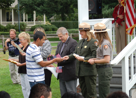 A new U.S. Citizen receives his Citizenship Certificate at Fort Vancouver in 2010