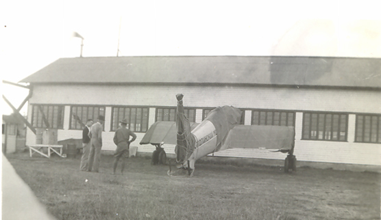 Historic black and white photo of the exterior of the historic hangar building at Pearson Air Museum
