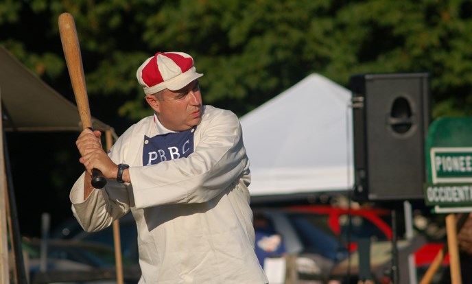 Photo of volunteer Bob Knight costumed as a member of the Pioneer Base Ball Club of Portland.