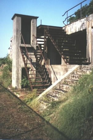Phone booth and stairs leading to loading platform (Photo by Roy V. Ashley)