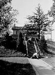Community members repair front steps of Cedar Hill in the 1920s.