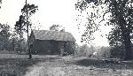 A view of the barn that is located on the grounds of Cedar Hill. Photo taken in the 1930s.