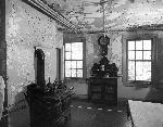 The kitchen in Cedar Hill shows badly needed restoration work. Photograph taken in the 1960s.