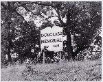 Memorial sign in front of Cedar Hill in 1964.