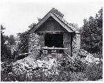 A photograph taken in 1970 of the Growlery. This building is an outbuilding on the Cedar Hill grounds where Frederick Douglass did some of  his writing and thinking.
