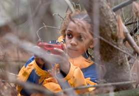 A young photographer explores the landscape of Franklin Park