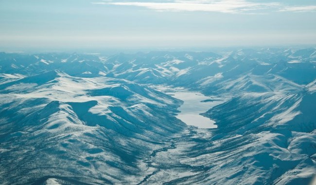 Aerial view of the Brooks Range in winter covered in snow