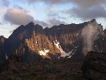 The alpenglow turns an Arrigetch Peak golden.