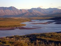 Broad river valley bathed in Alpenglow