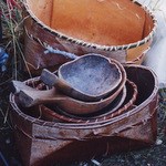 A collection of handmade birch bark baskets and hand carved wooden ladles.