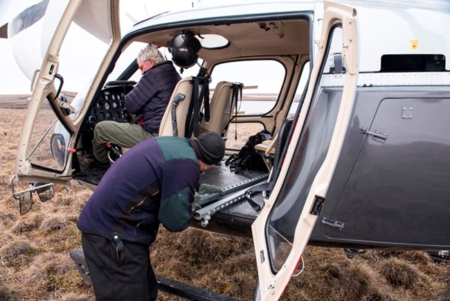 Loading a helicopter for a field work project