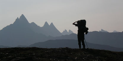 Rachel viewing the Arrigetch Peaks on a smoky day.