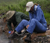 Filtering water.