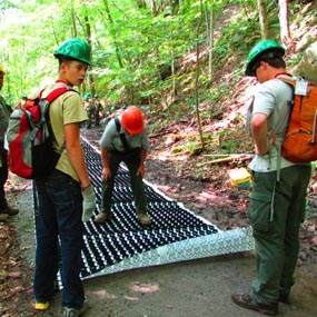 volunteers constructing an accessible trail
