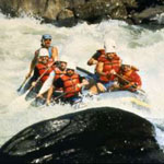 Rafters running a whitewater rapid on the Gauley River