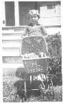 Officer's daughter in front of Quarters 1, 1935.