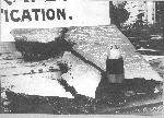 Steel plate smashed by 12-inch artillery shell.