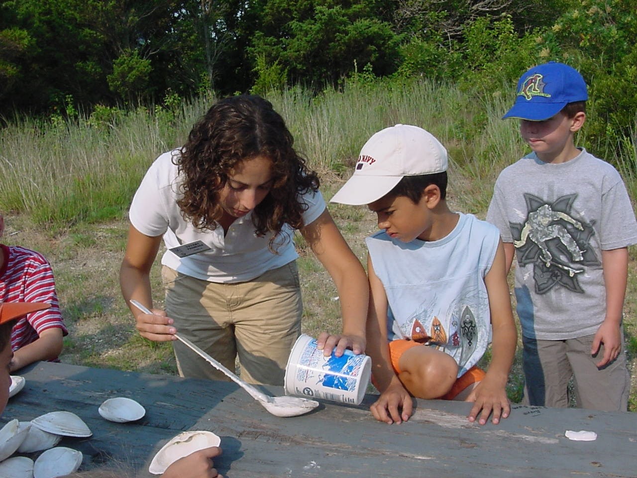 Students at Sandy Hook working with a Student Conservation Association intern.
