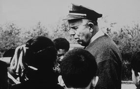 Herbert Johnson leading a school group tour in 1958