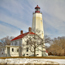 The lighthouse and keeper's quarters at Sandy Hook.