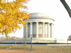 George Rogers Clark memroial with yellow fall leaves in the foreground
