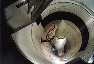 Head of Minuteman II missle emerges from underground