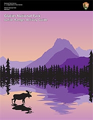 Cover of Jr Ranger book with moose in lake and mountain and forest background.