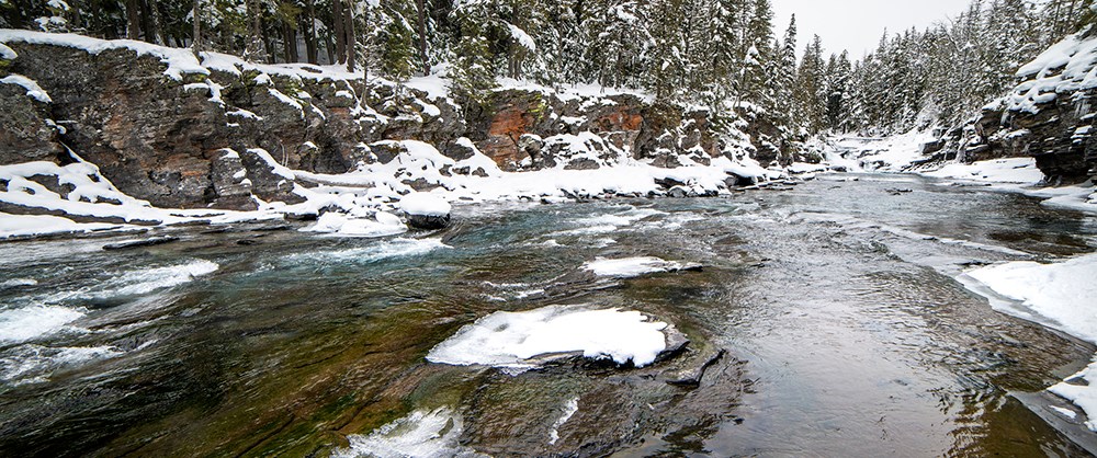 snow-covered river banks