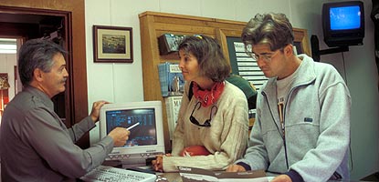 Ranger issuing a permit