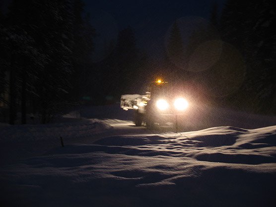 Picture of our Road Crew cleaning snow from the Headquarters parking lot